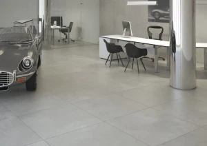 Wielkoformatowa-plyta-Cemento-100x100-cm-w-matowym-wykonczeniu,-przywodzaca-na-mysl-betonowe-powierzchnie-o-surowym-charakterze